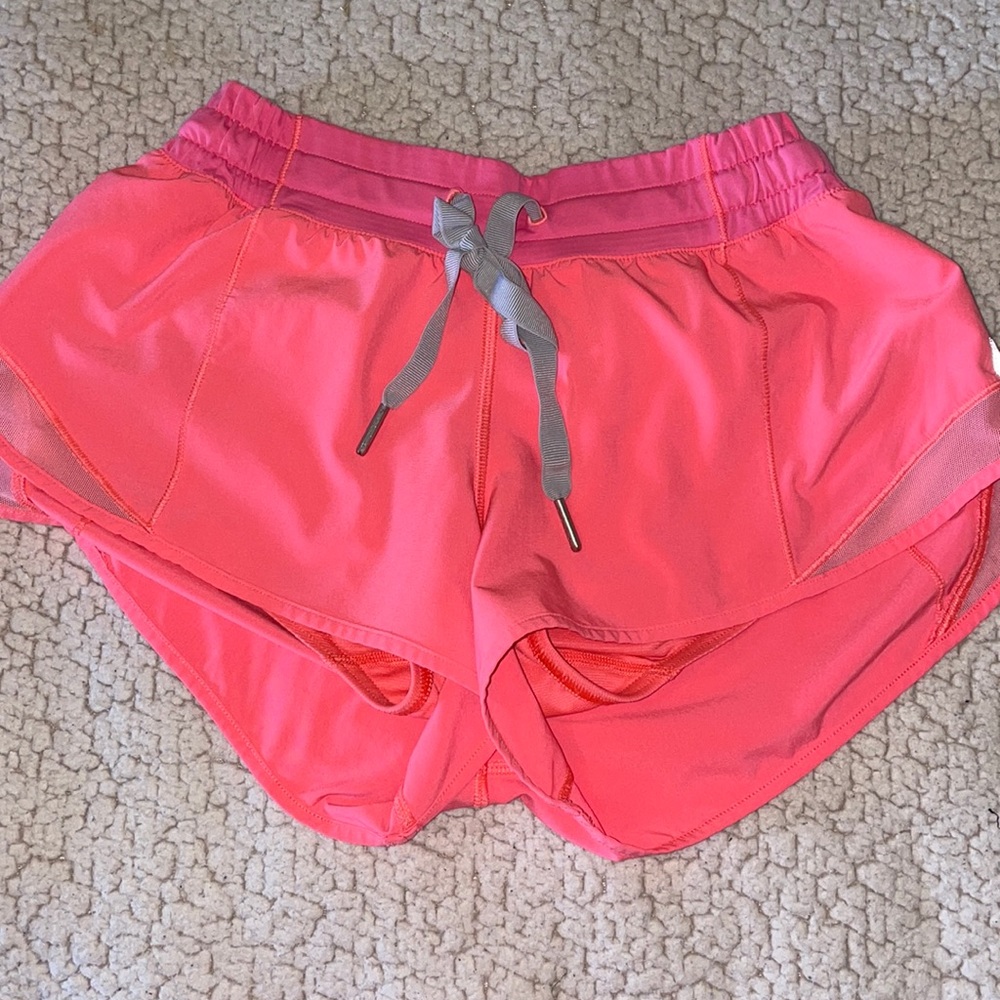 Neon pink Lululemon shorts